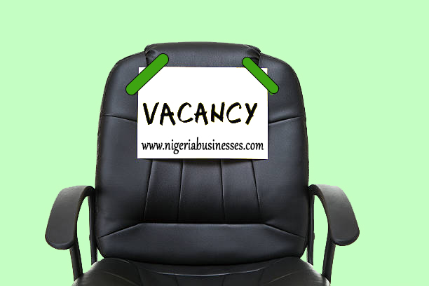 black leather office chair with yellow paper isolated on white background